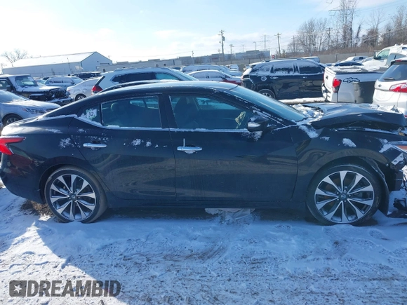2017 Nissan Maxima SV z VIN 1N4AA6AP1HC434427, wystawiony jako IAAI lot #41607323 z przebiegiem 102 352 mil mil oraz . Historia ofert i sprzedaży dostępna na DreamBid. Obrazek 13.