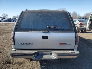 1993 GMC Yukon with VIN 1GKEK18K3PJ741909, listed as a Copart auction lot 46118535 with 241,936 mi miles and Clean Title. Bid and sale history available at carsss.com. Image 6.