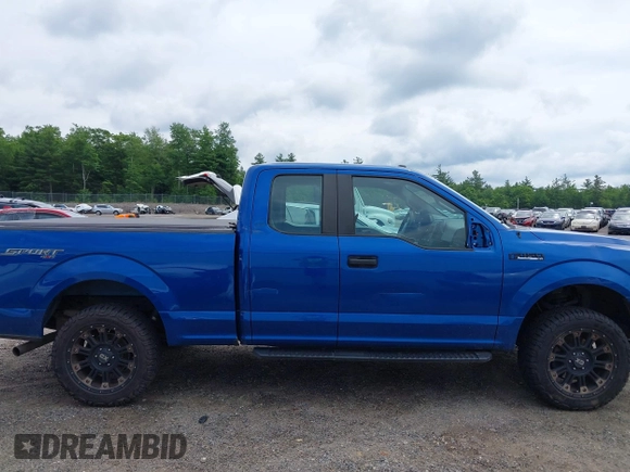 2018 Ford F-150 XL with VIN 1FTEX1EP5JFB17813, listed as a IAAI auction lot 42611333 with 112,166 mi miles and . Bid and sale history available at DreamBid. Image 13.