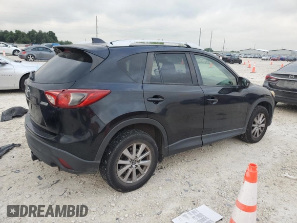 2015 Mazda CX-5 Touring with VIN JM3KE4CYXF0446370, listed as a Copart auction lot 52392575 with 132,419 mi miles and Salvage Title. Bid and sale history available at DreamBid. Image 3.
