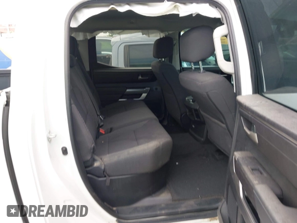 2023 Toyota Tundra SR5 with VIN 5TFLA5DB0PX077679, listed as a IAAI auction lot 42354545 with 31,838 mi miles and . Bid and sale history available at DreamBid. Image 8.