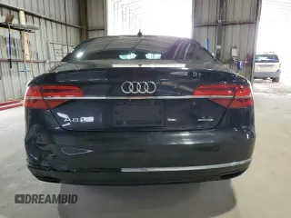 2015 Audi A8 3.0T z VIN WAU3GAFD2FN040940, wystawiony jako Copart lot #65327685 z przebiegiem 113 443 mil mil oraz Czysty tytuł • Clean title. Historia ofert i sprzedaży dostępna na DreamBid. Obrazek 6.