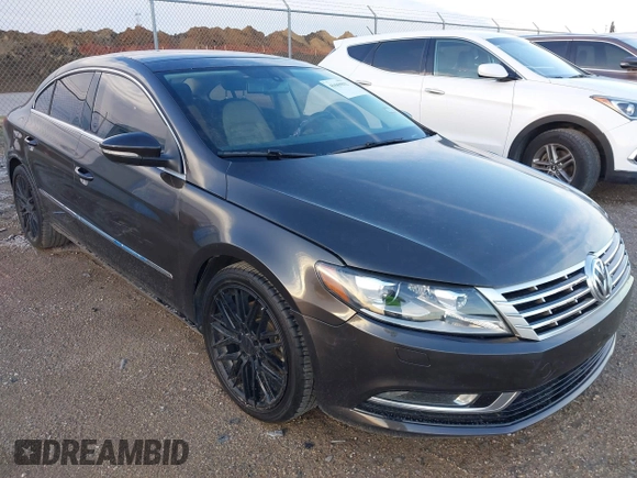 2015 Volkswagen CC Lux with VIN WVWRP7AN9FE819154, listed as a IAAI auction lot 41669832 with 151,142 mi miles. Bid and sale history available at carsss.com. Image 6.