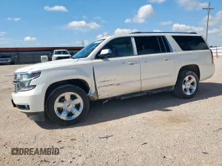 2015 Chevrolet Suburban LTZ with VIN 1GNSCKKC6FR705660, listed as a Copart auction lot 60328685 with 174,247 mi miles and Salvage title. Bid and sale history available at DreamBid. Image 1.