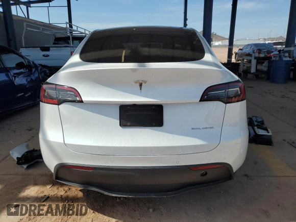2022 Tesla Model Y Long Range z VIN 7SAYGDEE5NA015841, wystawiony jako Copart lot #57842275 z przebiegiem 51 952 mil mil oraz Szkody całkowita. Historia ofert i sprzedaży dostępna na DreamBid. Obrazek 6.