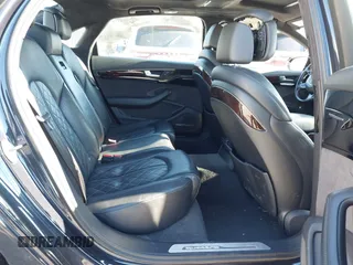 2017 Audi A8 L Sport with VIN WAU43AFDXHN003685, listed as a IAAI auction lot 41264314 with 114,828 mi miles. Bid and sale history available at carsss.com. Image 8.