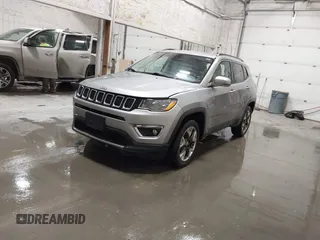 2020 Jeep Compass Limited with VIN 3C4NJDCB6LT148085, listed as a IAAI auction lot 41537903 with 55,878 mi miles and . Bid and sale history available at carsss.com. Image 2.