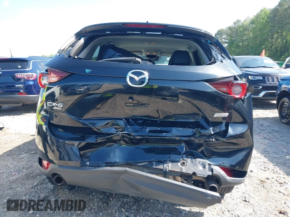 2017 Mazda CX-5 Touring z VIN JM3KFBCL0H0209458, wystawiony jako IAAI lot #42169599 z przebiegiem 93 287 mil mil oraz . Historia ofert i sprzedaży dostępna na DreamBid. Obrazek 6.