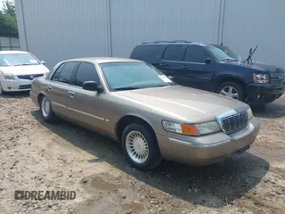 2002 Mercury Grand Marquis LS Premium z VIN 2MEFM75W72X638706, wystawiony jako IAAI lot #42398276 z przebiegiem 201 961 mil mil oraz . Historia ofert i sprzedaży dostępna na DreamBid. Obrazek 1.