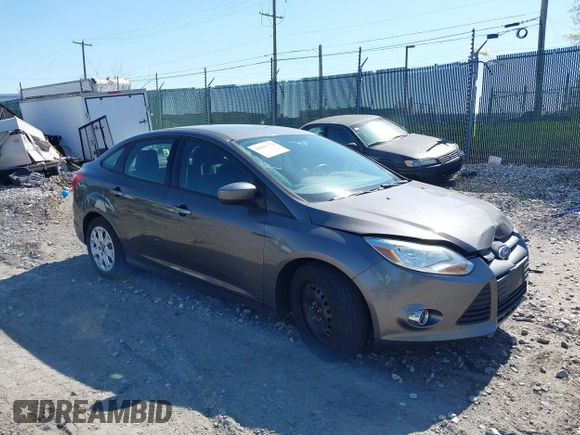 2012 Ford Focus SE with VIN 1FAHP3F27CL276208, listed as a IAAI auction lot 41995770 with 98,004 mi miles. Bid and sale history available at carsss.com. Image 1.