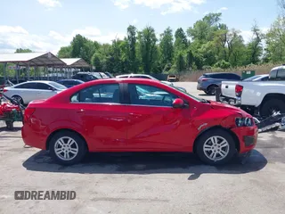 2012 Chevrolet Sonic LT with VIN 1G1JC5SH9C4130618, listed as a IAAI auction lot 42159538 with 120,367 mi miles and . Bid and sale history available at DreamBid. Image 13.