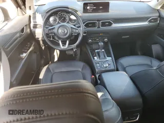 2021 Mazda CX-5 Touring z VIN JM3KFBCM5M0471172, wystawiony jako Copart lot #56646065 z przebiegiem 42 843 mil mil oraz Szkody całkowita. Historia ofert i sprzedaży dostępna na DreamBid. Obrazek 8.