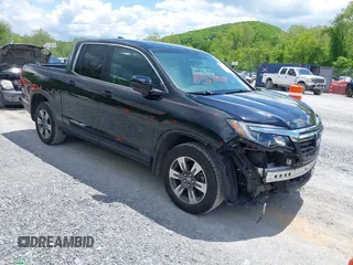 2017 Honda Ridgeline RTL z VIN 5FPYK3F51HB013989, wystawiony jako IAAI lot #42206513 z przebiegiem 146 124 mil mil oraz . Historia ofert i sprzedaży dostępna na DreamBid. Obrazek 1.