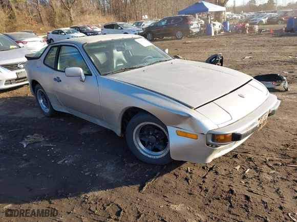 1984 Porsche 944 with VIN WP0AA0946EN453279, listed as a IAAI auction lot 41447115 with 102,553 mi miles. Bid and sale history available at carsss.com. Image 1.