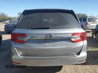 2018 Honda Odyssey LX with VIN 5FNRL6H22JB087152, listed as a Copart auction lot 76754974 with 73,057 mi miles and Salvage Title. Bid and sale history available at carsss.com. Image 6.