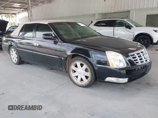 2007 Cadillac DTS Luxury I z VIN 1G6KD57Y67U170651, wystawiony jako IAAI lot #42410326 z przebiegiem 132 162 mil mil oraz . Historia ofert i sprzedaży dostępna na DreamBid. Obrazek 1.