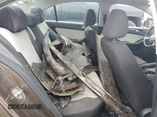 2015 Volkswagen Jetta S z VIN 3VW2K7AJ5FM293481, wystawiony jako Copart lot #58336035 z przebiegiem Nie podano mil oraz Szkoda całkowita • Salvage title. Historia ofert i sprzedaży dostępna na DreamBid. Obrazek 10.