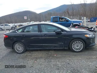 2015 Ford Fusion S Hybrid with VIN 3FA6P0UU8FR283233, listed as a IAAI auction lot 41501282 with 190,809 mi miles. Bid and sale history available at carsss.com. Image 13.