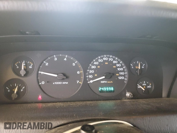 2003 Jeep Grand Cherokee Laredo with VIN 1J4GW48S43C567559, listed as a Copart auction lot 61431595 with 249,998 mi miles and Salvage title. Bid and sale history available at DreamBid. Image 9.