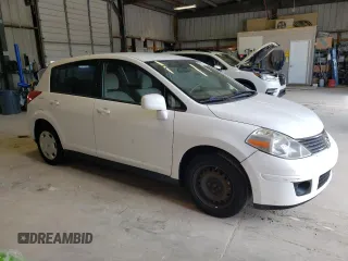 2009 Nissan Versa 1.8 S with VIN 3N1BC13E09L496658, listed as a Copart auction lot 67597234 with 125,854 mi miles and Salvage Title. Bid and sale history available at carsss.com. Image 4.