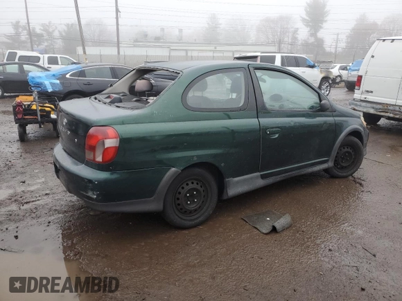 2000 Toyota ECHO with VIN JTDAT1231Y0041399, listed as a Copart auction lot 83774514 with 128,465 mi miles and Salvage Title. Bid and sale history available at DreamBid. Image 3.