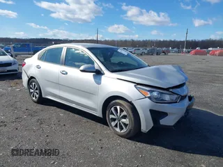 2023 Kia Rio LX with VIN 3KPA24ADXPE585372, listed as a IAAI auction lot 41591909 with 22,383 mi miles. Bid and sale history available at carsss.com. Image 1.