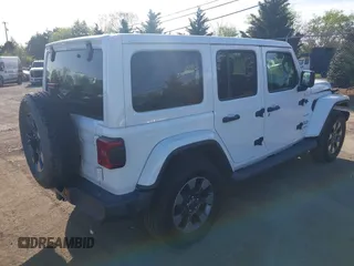 2018 Jeep Wrangler Unlimited Sahara z VIN 1C4HJXEG9JW227829, wystawiony jako IAAI lot #42099356 z przebiegiem 130 259 mil mil oraz . Historia ofert i sprzedaży dostępna na DreamBid. Obrazek 4.