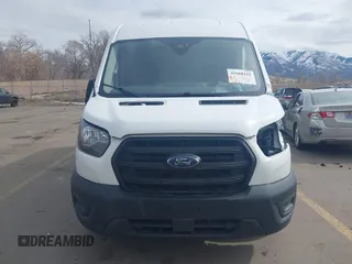 2020 Ford Transit Cargo with VIN 1FTBR2CG1LKB43034, listed as a IAAI auction lot 41668193 with 56,827 mi miles and . Bid and sale history available at DreamBid. Image 12.