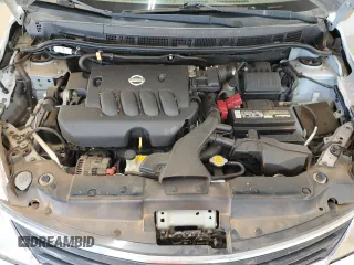 2009 Nissan Versa S z VIN 3N1BC13E19L388906, wystawiony jako Copart lot #53181175 z przebiegiem 52 493 mil mil oraz Szkoda całkowita • Salvage title. Historia ofert i sprzedaży dostępna na DreamBid. Obrazek 13.