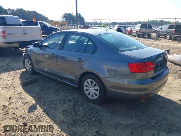2014 Volkswagen Jetta S z VIN 3VW2K7AJ3EM303858, wystawiony jako IAAI lot #42449072 z przebiegiem 171 959 mil mil oraz . Historia ofert i sprzedaży dostępna na DreamBid. Obrazek 3.