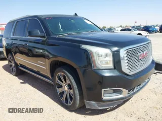 2015 GMC Yukon Denali z VIN 1GKS2CKJ8FR633915, wystawiony jako IAAI lot #42394084 z przebiegiem Nie podano mil oraz . Historia ofert i sprzedaży dostępna na DreamBid. Obrazek 1.