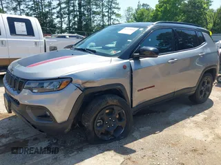 2023 Jeep Compass Trailhawk with VIN 3C4NJDDN3PT527995, listed as a IAAI auction lot 42218464 with 47,701 mi miles and . Bid and sale history available at carsss.com. Image 2.