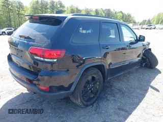 2019 Jeep Grand Cherokee Altitude with VIN 1C4RJFAG8KC808309, listed as a IAAI auction lot 41977457 with 122,923 mi miles and . Bid and sale history available at DreamBid. Image 4.