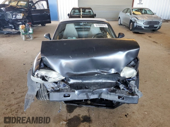 2003 Mazda MX-5 Miata Cloth with VIN JM1NB353730303334, listed as a Copart auction lot 51692615 with 142,789 mi miles and Salvage title. Bid and sale history available at DreamBid. Image 5.