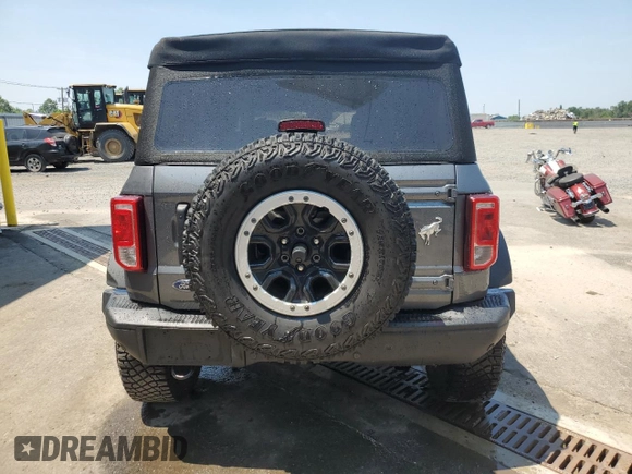 2023 Ford Bronco с VIN 1FMEE5DH2PLB21489, выставлен на аукционе Copart как лот 60690365 с пробегом 14 326 миль миль и Списание • Salvage title. История ставок и продаж доступна на DreamBid. Изображение 6.