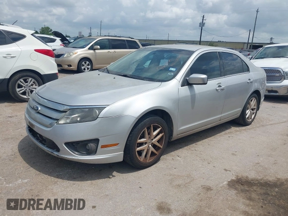 2012 Ford Fusion SEL with VIN 3FAHP0JG7CR302910, listed as a IAAI auction lot 42100004 with 215,761 mi miles. Bid and sale history available at carsss.com. Image 2.