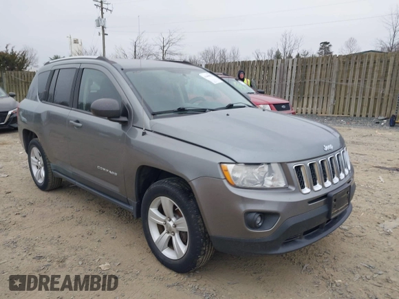 2011 Jeep Compass with VIN 1J4NT1FA2BD241485, listed as a IAAI auction lot 41496076 with 134,825 mi miles. Bid and sale history available at carsss.com. Image 1.