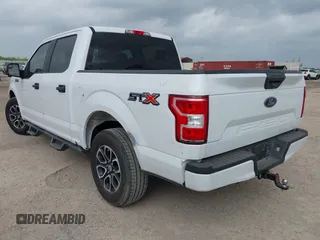 2018 Ford F-150 XL with VIN 1FTEW1C52JKC49228, listed as a IAAI auction lot 42162616 with 148,329 mi miles. Bid and sale history available at carsss.com. Image 3.