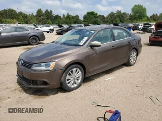2013 Volkswagen Jetta SE with VIN 3VWDP7AJXDM285304, listed as a Copart auction lot 56649735 with 180,599 mi miles and Salvage title. Bid and sale history available at DreamBid. Image 1.