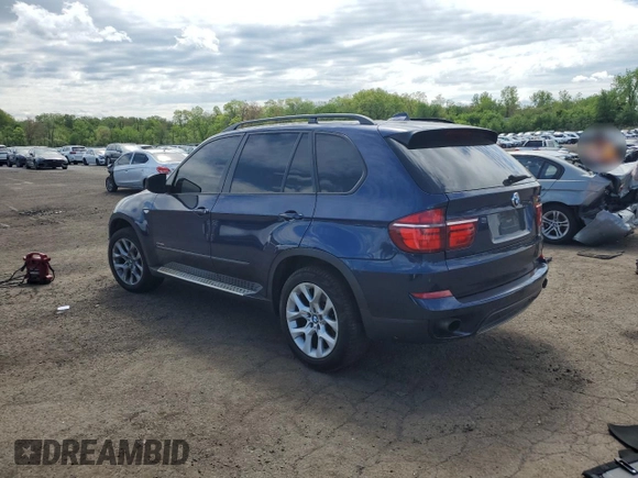 2012 BMW X5 35i with VIN 5UXZV4C56CL754643, listed as a Copart auction lot 55970125 with 150,584 mi miles and Salvage title. Bid and sale history available at DreamBid. Image 2.