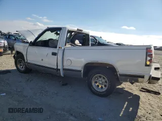 1996 Chevrolet Silverado 1500 with VIN 1GCEC14R1TZ185395, listed as a Copart auction lot 42244085 with 545,084 mi miles and Salvage Title. Bid and sale history available at DreamBid. Image 2.