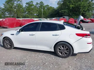 2020 Kia Optima LX with VIN 5XXGT4L30LG390927, listed as a IAAI auction lot 42642424 with 84,697 mi miles and . Bid and sale history available at DreamBid. Image 14.