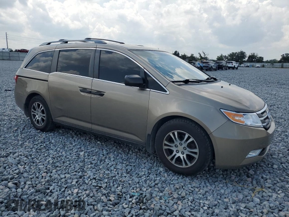 2012 Honda Odyssey LX with VIN 5FNRL5H25CB109643, listed as a Copart auction lot 55951805 with 128,341 mi miles and Clean Title. Bid and sale history available at carsss.com. Image 4.