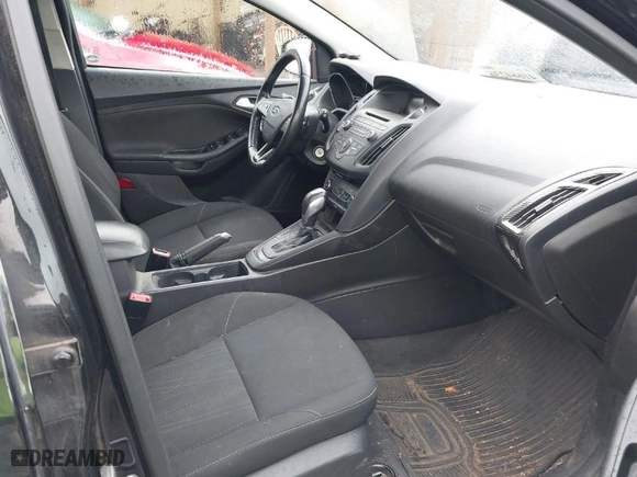 2015 Ford Focus SE with VIN 1FADP3K24FL370068, listed as a IAAI auction lot 41664236 with 328,569 mi miles. Bid and sale history available at carsss.com. Image 5.