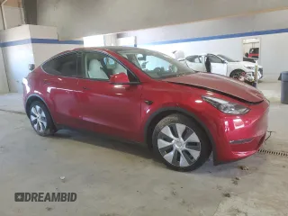 2024 Tesla Model Y Long Range with VIN 7SAYGDEE6RF995069, listed as a Copart auction lot 57085405 with 22,302 mi miles and Salvage title. Bid and sale history available at DreamBid. Image 4.