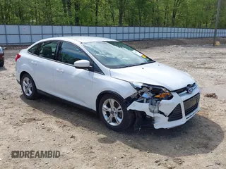 2012 Ford Focus SE with VIN 1FAHP3F2XCL122141, listed as a IAAI auction lot 42008877 with 122,743 mi miles. Bid and sale history available at carsss.com. Image 1.
