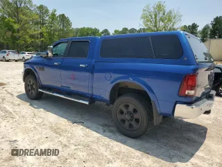 2015 Ram 2500 Laramie with VIN 3C6UR5FL5FG582579, listed as a Copart auction lot 58382715 with 128,605 mi miles and Salvage title. Bid and sale history available at DreamBid. Image 2.