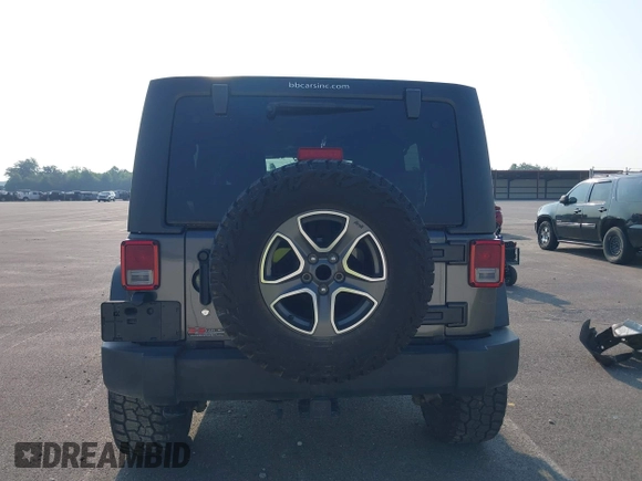 2018 Jeep Wrangler Unlimited Sport S with VIN 1C4BJWDG6JL854359, listed as a IAAI auction lot 42423170 with 84,470 mi miles and . Bid and sale history available at DreamBid. Image 17.
