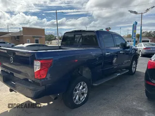 2017 Nissan Titan XD SL with VIN 1N6BA1F28HN511102, listed as a Copart auction lot 87049584 with 138,402 mi miles and Clean Title. Bid and sale history available at carsss.com. Image 4.