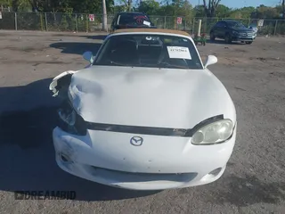 2003 Mazda MX-5 Miata Cloth z VIN JM1NB353730312566, wystawiony jako IAAI lot #41782864 z przebiegiem Nie podano mil oraz . Historia ofert i sprzedaży dostępna na DreamBid. Obrazek 12.